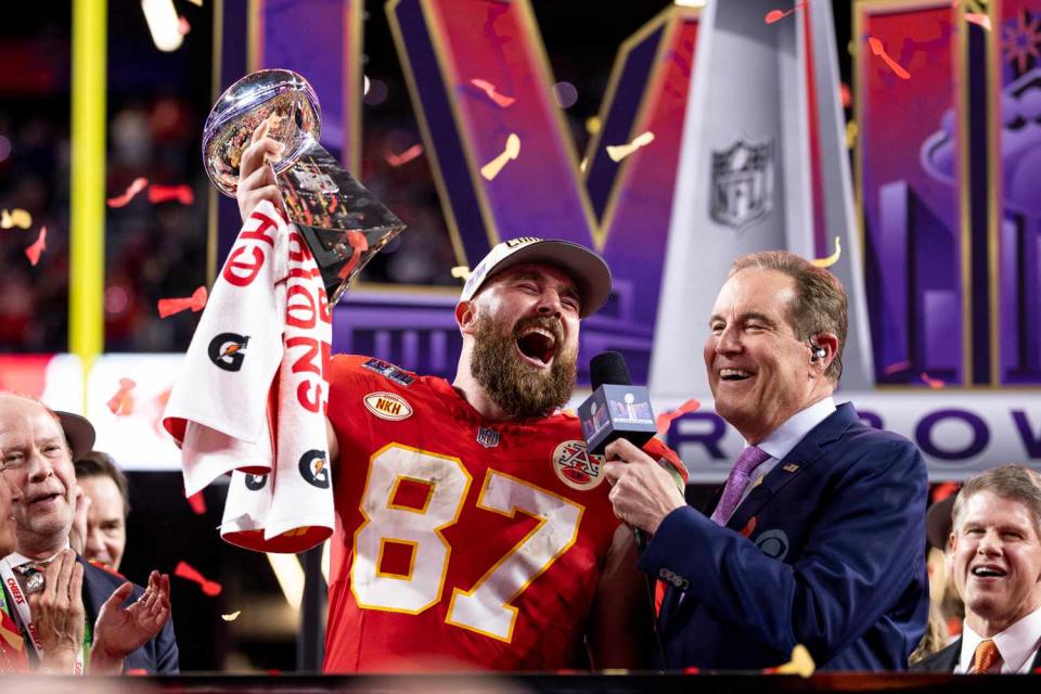<p>Michael Owens/Getty</p> Travis Kelce with the Vince Lombardi trophy