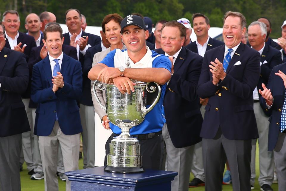 FARMINGDALE, NY - MAY 19:  Brooks Koepka of the United States leans on the Wanamaker Trophy after winning the 2019 PGA Championship at the Bethpage Black course with a score of 8 under par on May 19, 2019 in Farmingdale, New York.(Photo by Rich Graessle/Icon Sportswire via Getty Images)