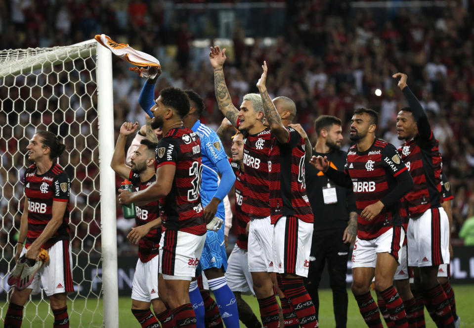 Players of Brazil's Flamengo celebrate winning 2-1 against Argentina's Velez Sarsfield at the end of a Copa Libertadores semifinal second leg soccer match at Maracana stadium in Rio de Janeiro, Brazil, Wednesday, Sept. 7, 2022. Brazil's Flamengo qualified to the final. (AP Photo/Bruna Prado)