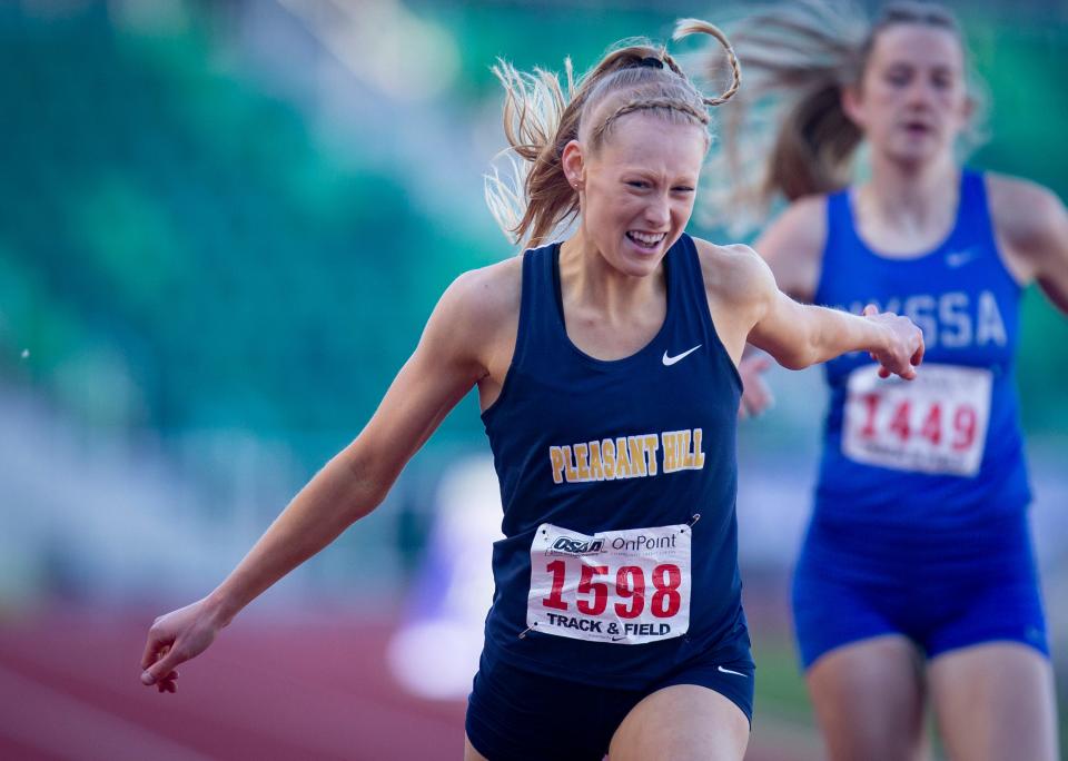 Pleasant Hill’s Dakota Hyland sprints to a first-place finish in the 3A girls 400 meters at the OSAA State Track & Field Championships at Hayward Field in Eugene Friday, May 20, 2022.