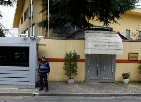 A Turkish police officer stands guard outside the Saudi Arabia's consulate in Istanbul, Turkey October 9, 2018. REUTERS/Osman Orsal