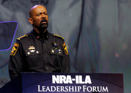 FILE PHOTO - Sheriff David Clark addresses members of the National Rifle Association during their NRA-ILA Leadership Forum at their annual meeting in Louisville, Kentucky, U.S. on May 20, 2016. REUTERS/John Sommers II/File Photo