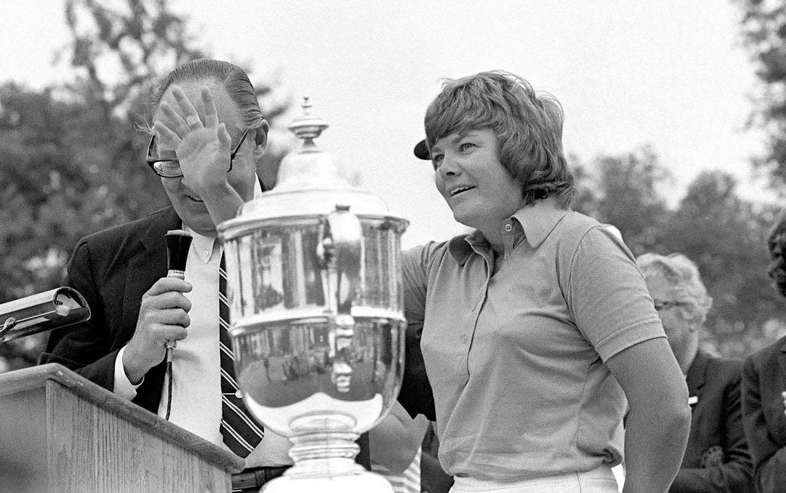 Sandra Haynie of Dallas, Texas, accepts a trophy for winning the U.S. Women’s Open Golf Tournament in La Grange, Ill., Sunday, July 22, 1974. (AP Photo)