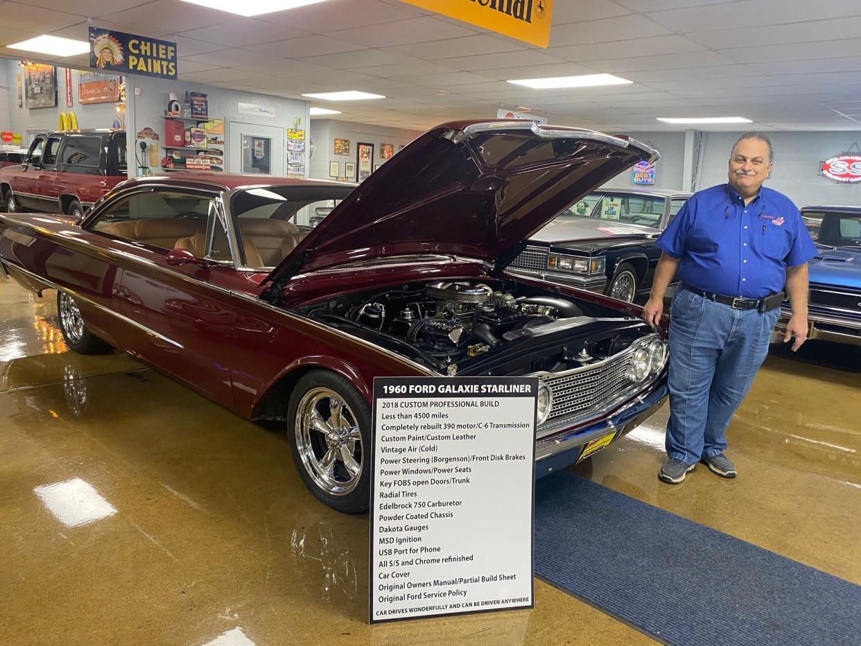 Johnny Matthes' burgundy 1960 Ford Galaxie Starliner sits in his private museum on Ashland Road. He said the former owner spent over $100,000 to restore the car with its all-new, custom leather interior and a 390 motor/C-6 transmission, then drove it 4,000 miles along Route 66, the entire length, before selling it to Matthes.