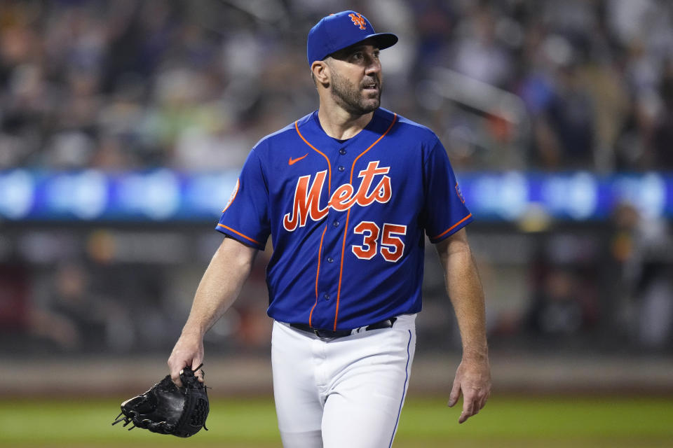 New York Mets starting pitcher Justin Verlander looks at the scoreboard as he leaves the field during the eighth inning of the team's baseball game against the Chicago White Sox on Wednesday, July 19, 2023, in New York. (AP Photo/Frank Franklin II)