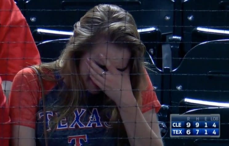 A fan can't hold back her emotions following Francisco Lindor's game-winning grand slam. (MLB.TV)