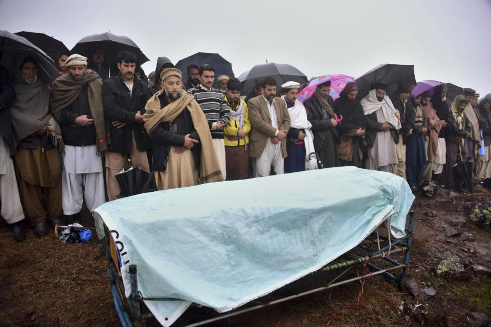 Villagers carry offering funeral prayer of a boy, who was killed by Indian shelling, at a village in Hatian Bala, 40 kilometers from Muzafarabad, capital of Pakistani Kashmir, Saturday, March 2, 2019. Indian and Pakistani soldiers again targeted each other's posts and villages along their volatile frontier in disputed Kashmir, killing at some civilians and wounding few others, officials said. (AP Photo/M.D. Mughal)