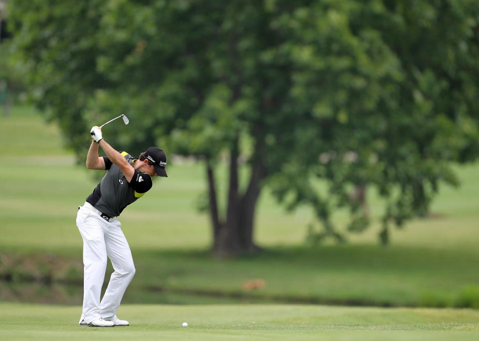 MEMPHIS, TN - JUNE 10: Rory McIlroy of Northern Ireland hits his second shot on the par 4 9th hole during the final round of the FedEx St. Jude Classic at TPC Southwind on June 10, 2012 in Memphis, Tennessee. (Photo by Andy Lyons/Getty Images)