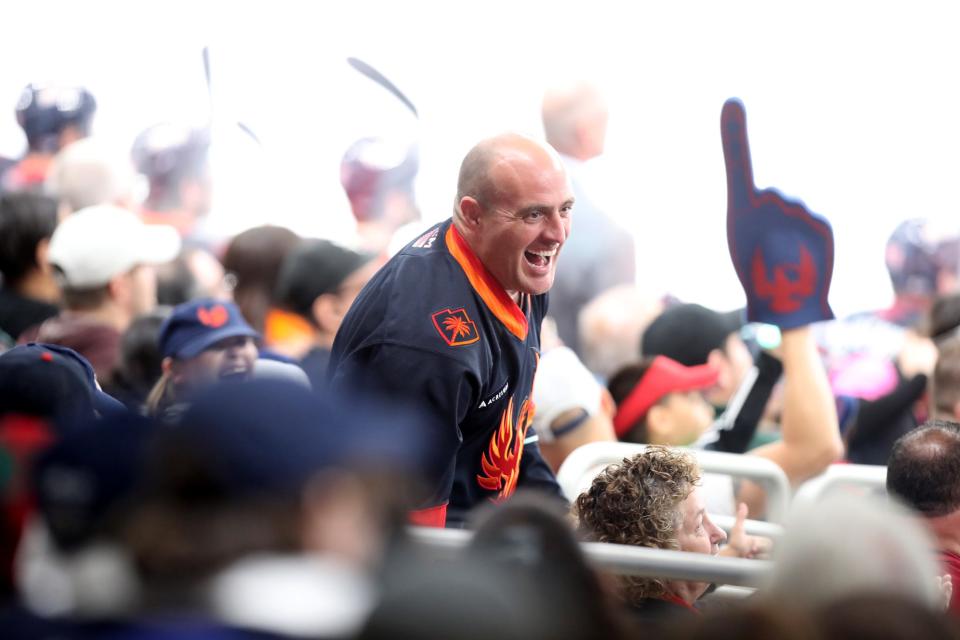 Fans cheer for the Coachella Valley Firebirds during game five of the second round of the 2023 Calder Cup Playoffs against the Colorado Eagles at Acrisure Arena in Palm Desert, Calif., on Friday, May 5, 2023. Firebirds won 5-0. 