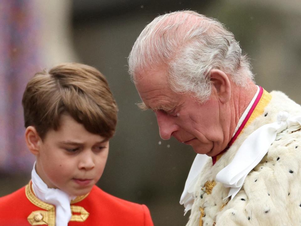 Britain's King Charles and Prince George stand during the coronation ceremony at Westminster Abbey, in London, Britain May 6, 2023.