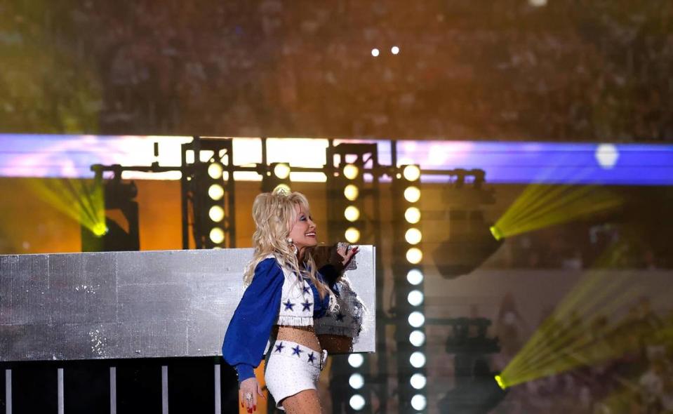 Dolly Parton performs during the Dallas Cowboys’ halftime show to kickoff the Red Kettle Campaign on Thursday, November 23, 2023, at AT&T Stadium in Arlington. Amanda McCoy/amccoy@star-telegram.com