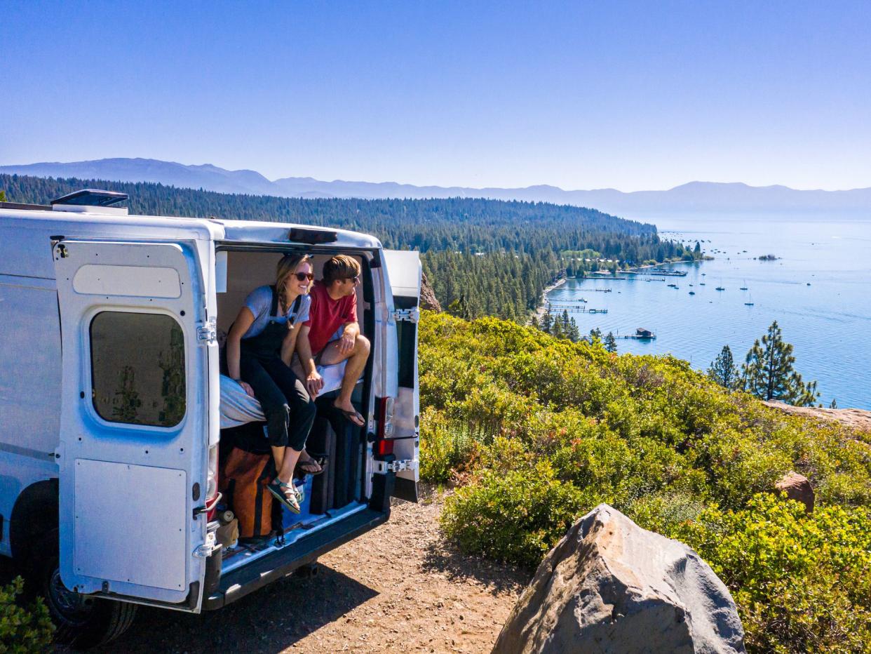 A Young Couple Parked Van at a Viewpoint of Lake Tahoe