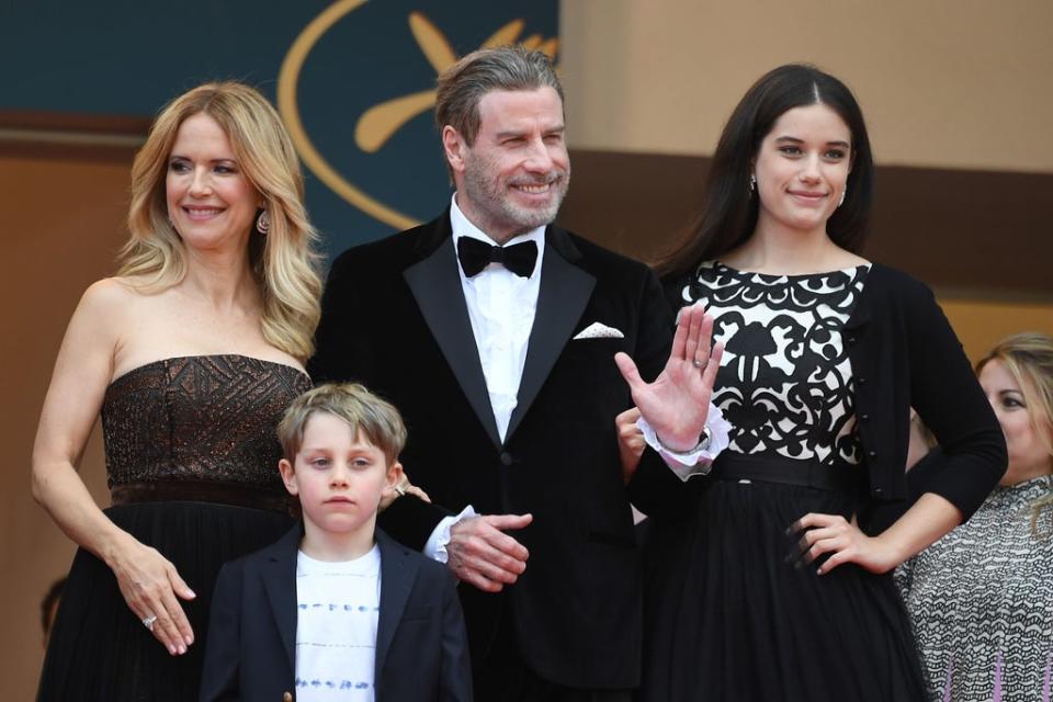 Kelly Preston and John Travolta pictured with their children Ella and Benjamin in 2018 (AFP via Getty Images)