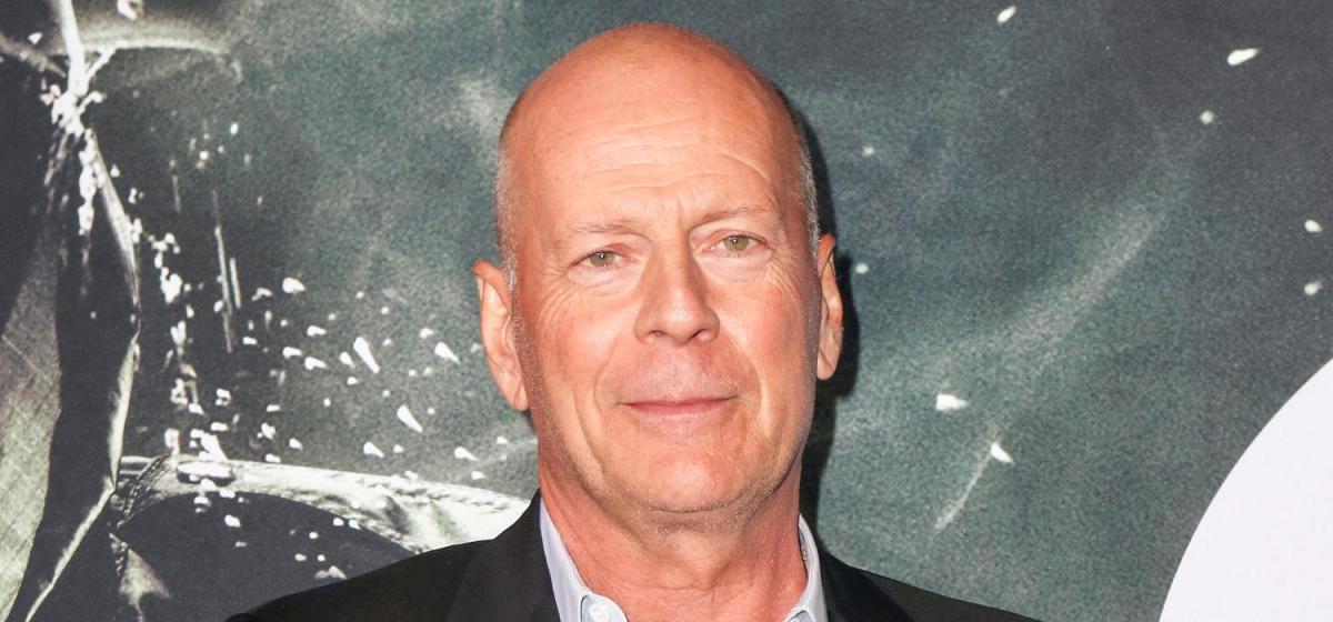 Bruce Willis spotted driving with bodyguards during rare outing to battle dementia