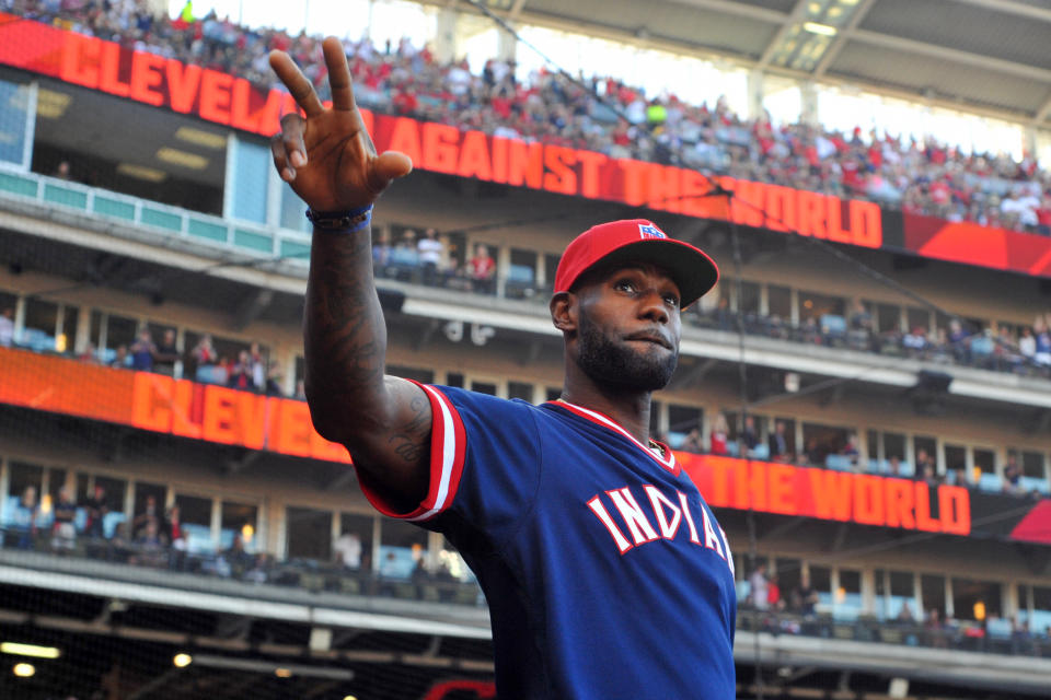 CLEVELAND, OH - OCTOBER 7, 2016: Forward LeBron James #23 of the Cleveland Cavaliers walks onto the field to address the crowd prior to Game 2 of the American League Division Series between the Boston Red Sox and Cleveland Indians on October 7, 2016 at Progressive Field in Cleveland, Ohio. Cleveland won 6-0.  164_0001 2016 Nick Cammett/Diamond Images/Getty Images  