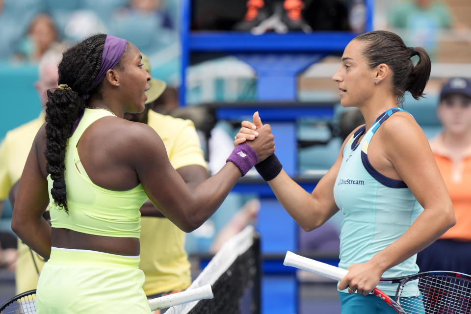Caroline Garcia, of France, right, and Coco Gauff congratulate each other after Garcia beat Gauff during the Miami Open tennis tournament, Monday, March 25, 2024, in Miami Gardens, Fla. (AP Photo/Wilfredo Lee)