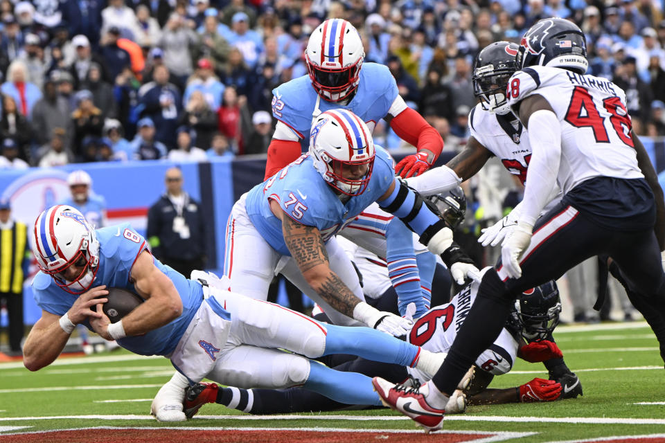 Tennessee Titans quarterback Will Levis (8) runs into the end zone for a touchdown against the Houston Texans during the first half of an NFL football game, Sunday, Dec. 17, 2023, in Nashville, Tenn. (AP Photo/John Amis)