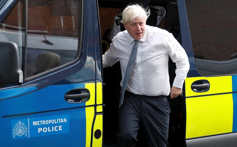 Prime Minister Boris Johnson leaves a police vehicle after watching a drugs-related raid by Metropolitan Police officers (Peter Nicholls/PA) (PA Wire)