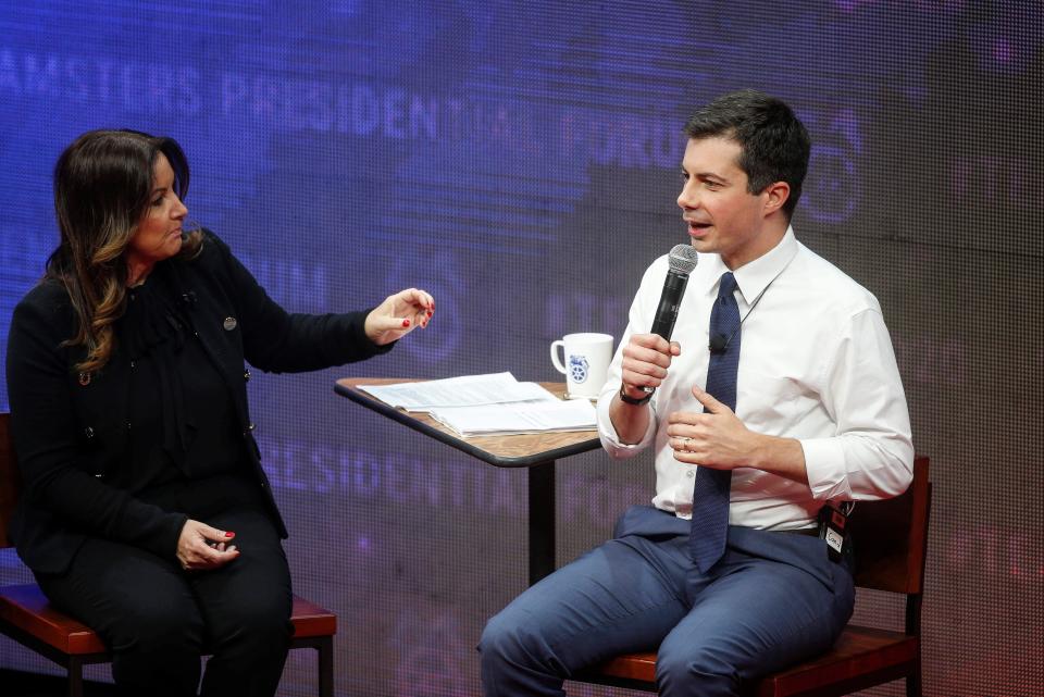 Journalist Leslie Marshall speaks with South Bend, Indiana, mayor and current Democratic presidential candidate hopeful Pete Buttigieg during the Teamsters Presidential Candidate Forum at Veterans Memorial Coliseum in Cedar Rapids on Saturday, Dec. 7, 2019.