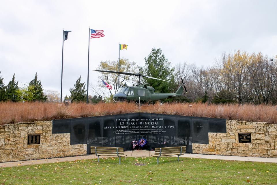 Wreaths with the American flag lay at the memorial site after a Veterans Day ceremony on Thursday, Nov. 11, 2021, at LZ Peace Memorial in Rockford.