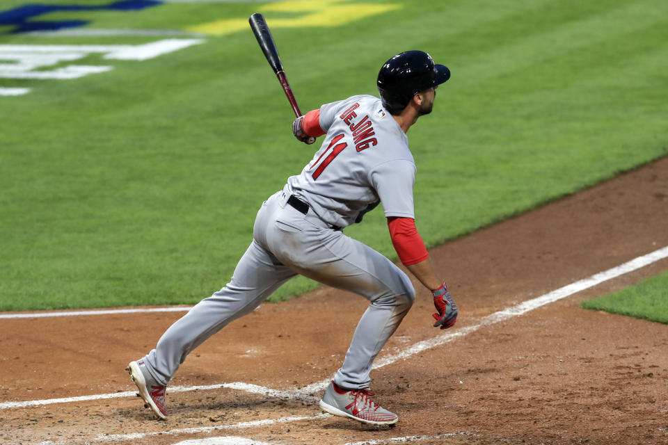 St. Louis Cardinals' Paul DeJong hits a grand slam in the fourth inning of a baseball game against the Cincinnati Reds in Cincinnati, Monday, Aug. 31, 2020. (AP Photo/Aaron Doster)