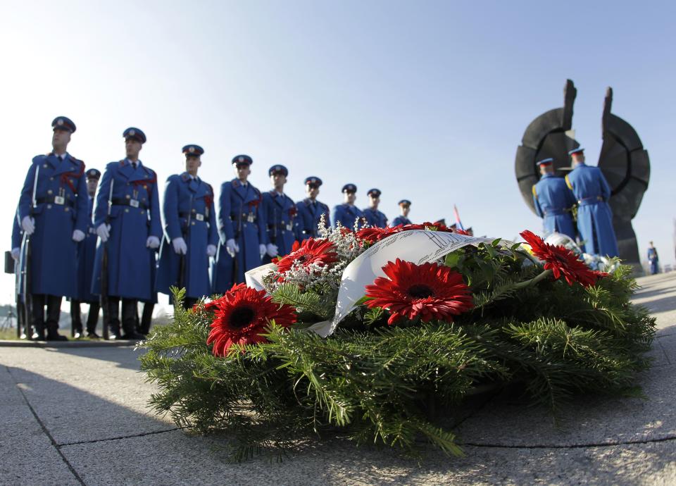 <p>Members of the guard of honour of the Serbian army prepare for the memorial service for the victims of the Holocaust at the monument of victims of World War II Nazi concentration camp Sajmiste, in Belgrade, Serbia, Jan. 26, 2018. (Photo: Andrej Cukic/EPA-EFE/REX/Shutterstock) </p>