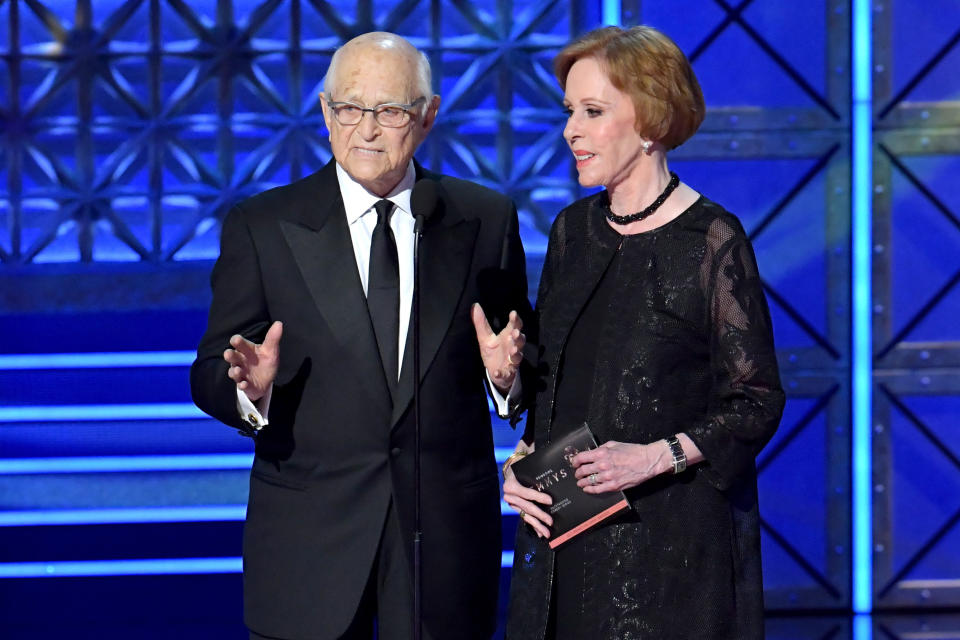 Writer-producer Norman Lear and actor-comedian Carol Burnett speak onstage during the 69th Annual Primetime Emmy Awards at Microsoft Theater on Sept. 17, 2017 in Los Angeles, California.