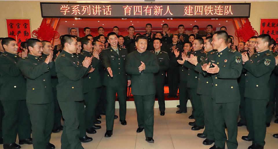 ZHANGJIAKOU, Jan. 25, 2017 — Chinese President Xi Jinping (C), also general secretary of the Communist Party of China Central Committee and chairman of the Central Military Commission, visits soldiers and officers of the 65th Army Group in Zhangjiakou City, north China’s Hebei Province, Jan. 23, 2017. Xi visited the 65th Army Group stationed in northern China’s Hebei Province on Monday. (Xinhua/Li Gang via Getty Images)