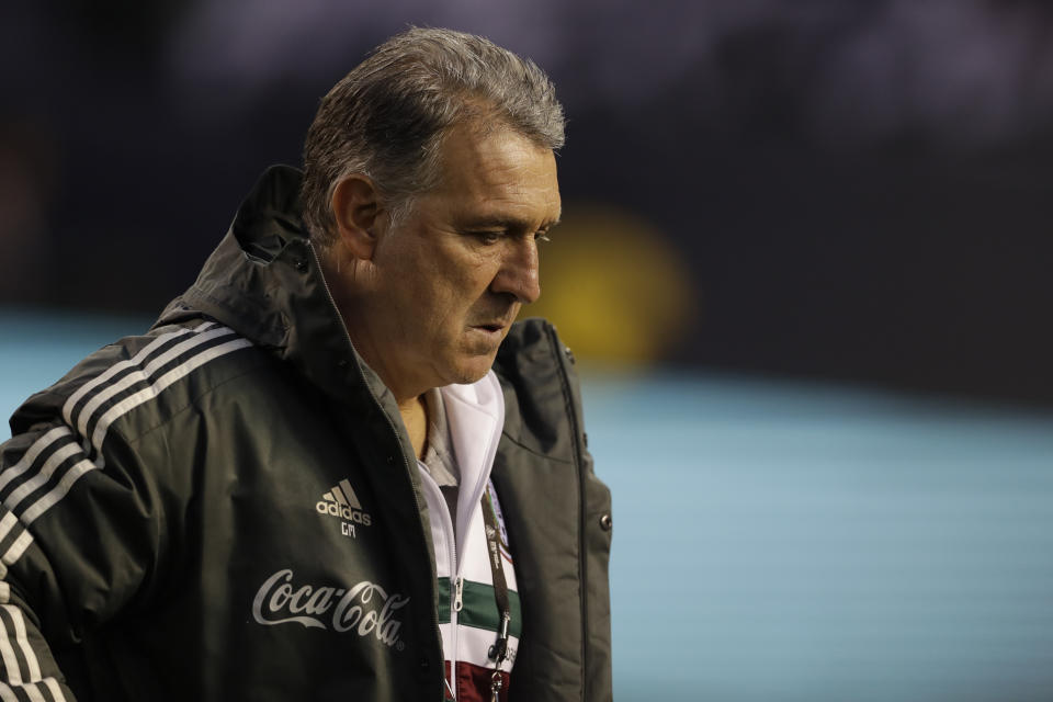 Mexico's head coach Gerardo Martino looks on before an international friendly soccer match against Chile, Friday, March 22, 2019, in San Diego. (AP Photo/Gregory Bull)