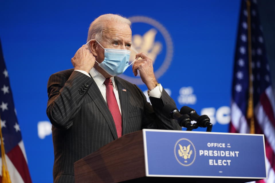 President-elect Joe Biden, accompanied by Vice President-elect Kamala Harris, speaks at The Queen theater, Thursday, Nov. 19, 2020, in Wilmington, Del. (AP Photo/Andrew Harnik)