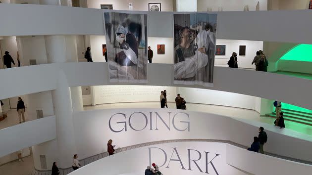 Unmute Gaza members unfurled banners in the Guggenheim Museum in New York to draw attention to their campaign.