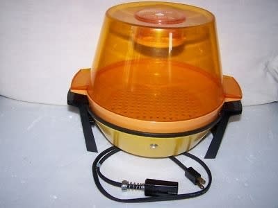 An old-school plug-in popcorn-maker