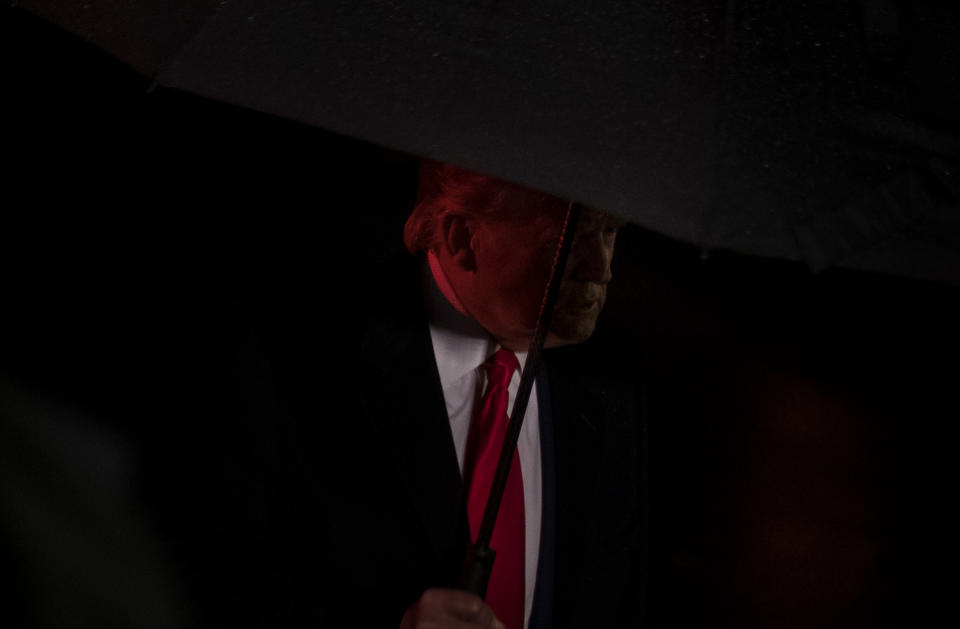 President Donald Trump speaks with reporters before boarding Marine One at the White House in Washington, D.C., Dec. 10, 2019. | Gabriella Demczuk for TIME