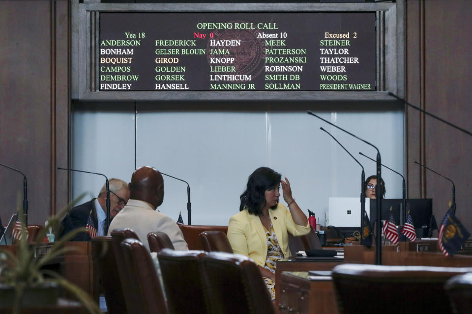 FILE - Democratic senators sit at their desks during a roll call at a Senate session at the Oregon State Capitol in Salem, Ore., Tuesday, June 6, 2023. The Senate failed to achieve a quorum because of the Republican-led walkout. The Oregon Supreme Court said Thursday, Feb. 1, 2024, that 10 Republican state senators who staged a record-long walkout last year to stall bills on abortion, transgender health care and gun rights cannot run for reelection. (AP Photo/Amanda Loman, File)