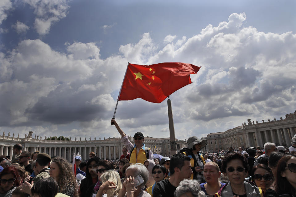 FILE - Chinese faithful attend Pope Francis weekly general audience in St. Peter's Square at the Vatican, Wednesday, May 22, 2019. In an interview with The Associated Press, Tuesday, Jan. 24, 2023, Pope Francis said that sometimes Chinese authorities are somewhat "closed." Francis has been criticized by some segments of the Catholic Church over a 2018 agreement with Beijing over the appointment of bishops in China. Among those critics is Cardinal Joseph Zen, of Hong Kong. In the interview, Francis called Zen a "tender soul" and recalled spending time with him after the funeral of Pope Benedict XVI earlier this month. (AP Photo/Alessandra Tarantino, file)