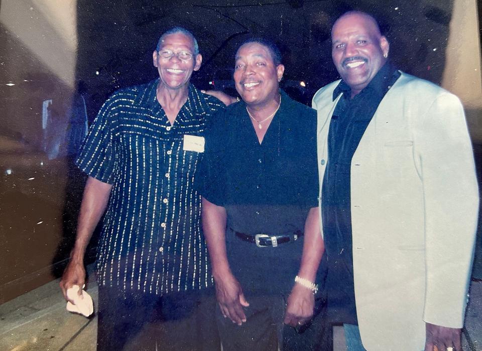 Austin sports legend and former pro football player John Harvey, left, poses with childhood friends William Ward and Thomas Henderson. Harvey died May 30 at 74. He was the first Black player signed to a football scholarship by Texas coach Darrell Royal, but he did not qualify academically, so he went to Tyler Junior College. There he earned All-America status before leaving for UT-Arlington for one season. After his college career ended, Harvey signed with the Canadian Football League’s Montreal Alouettes, coached by future Hall of Famer Marv Levy.