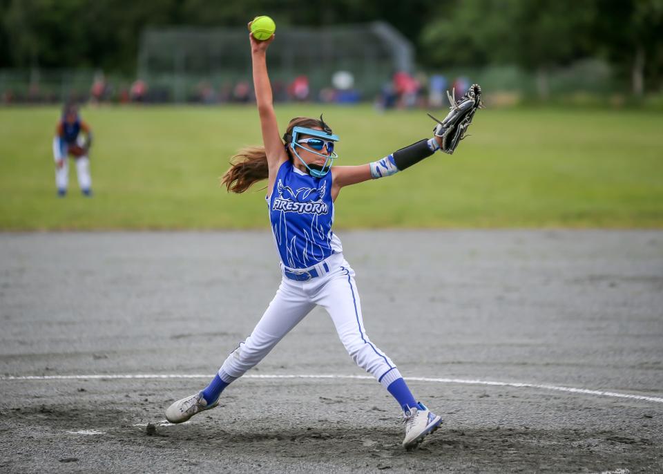 Fairhaven Firestorm starting pitcher Sophia Almeida delivers during the third inning of her team's match up with the Dartmouth Dynamites on Friday evening. The Firestorm defeated the Dynamites 8-2 and Almeida was the winning pitcher tossing a complete game.