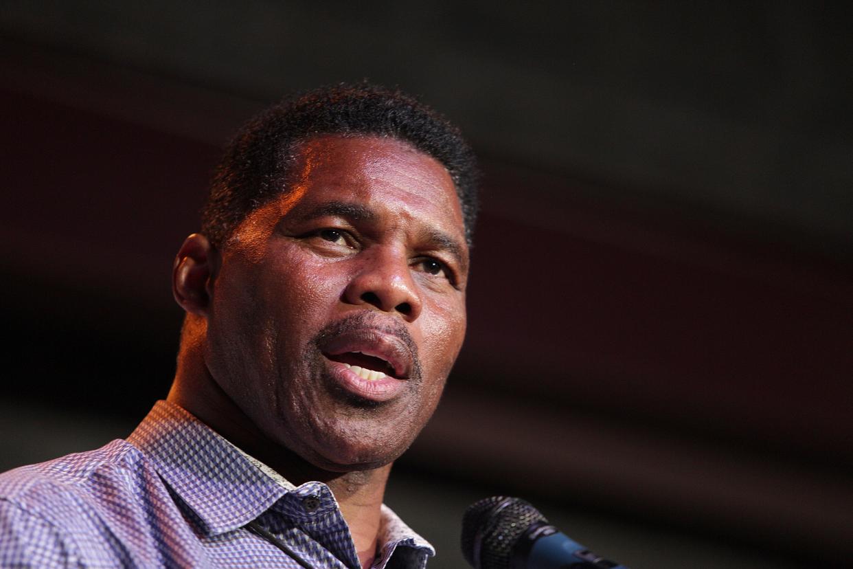 Herschel Walker speaks at a primary watch party on May 23, 2022, at the Foundry restaurant in Athens, Ga.