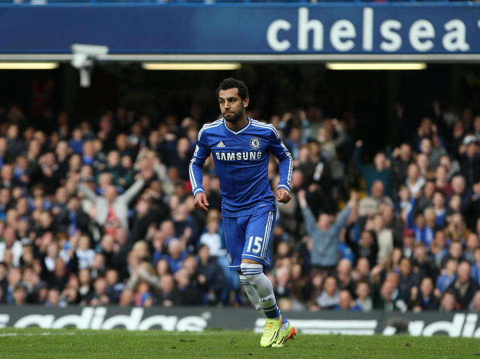 Chelsea's Mohamed Salah turns as he celebrates after scoring the opening goal of the English Premier League soccer match between Chelsea and Stoke City at Stamford Bridge stadium in London, Saturday, April, 5, 2014. (AP Photo/Alastair Grant)