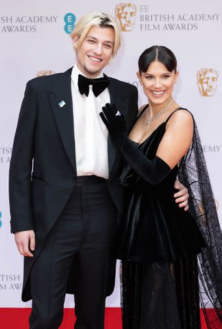 Jeff Spicer/Getty Jake Bongiovi and Millie Bobby Brown attend the EE British Academy Film Awards 2022 at Royal Albert Hall on March 13, 2022, in London