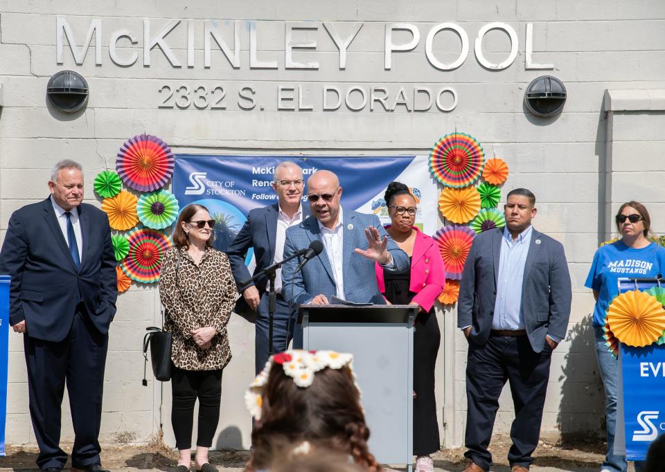 Stockton city manager Harry Black, center, backed by city council members Dan Wright, left, Susan Lenz, Michael Blower, vice mayor Kimberly Warmsley, council members Brando Villapudua and Michelle Padilla, speaks at the groundbreaking ceremony for extensive renovations to the park in south tStockton on Apr. 23, 2024.