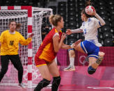 <p>Anna VYAKHIREVA (13) of Team ROC in action in the Women's Quarterfinal handball match between Montenegro and ROC during the Tokyo 2020 Olympic Games at Yoyogi National Stadium on August 04, 2021 in Tokyo, Japan. (Photo by Alexander Safonov/Anadolu Agency via Getty Images)</p> 