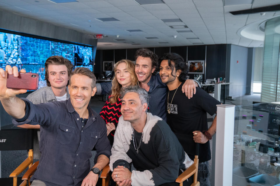 (L-R) Joe Keery, Ryan Reynolds, Jodie Comer, Taika Waititi, director Shawn Levy and Utkarsh Ambudkar on the set of 20th Century Studiosâ€™ FREE GUY. Photo by Alan Markfield. Â© 2020 Twentieth Century Fox Film Corporation.  All Rights Reserved.