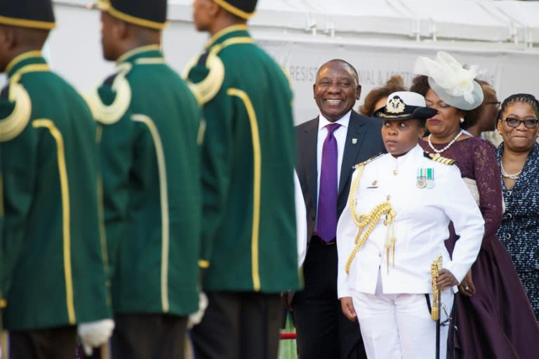 South Africa's Cyril Ramaphosa grins before giving his first major speech as president