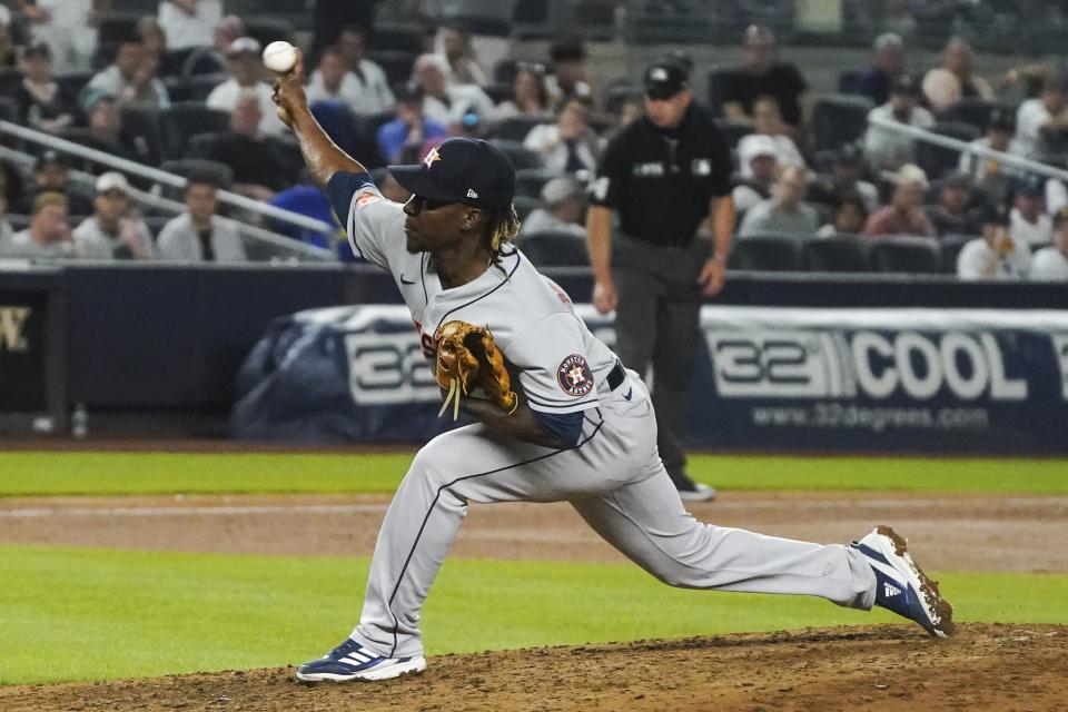 Houston Astros relief pitcher Rafael Montero throws during the ninth inning of the team's baseball game against the New York Yankees, Friday, June 24, 2022, in New York. (AP Photo/Bebeto Matthews)