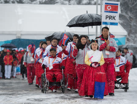 The delegation and the team of North Korea arrive at The Paralympic Village in Pyeongchang, South Korea, March 8, 2018. OIS/IOC/Thomas Lovelock/Handout via Reuters