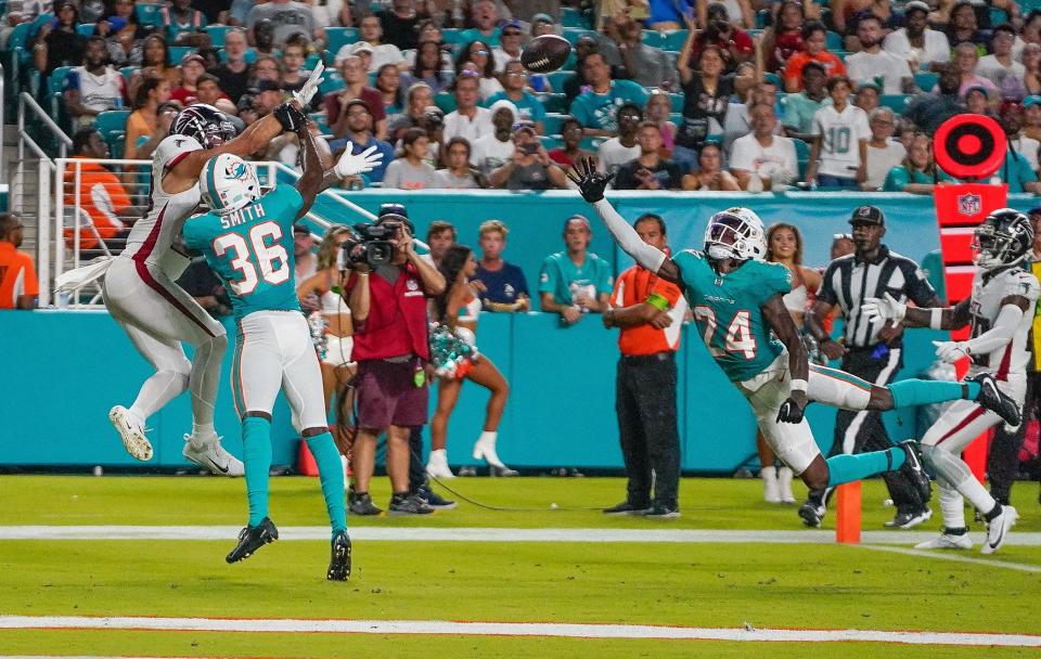 Miami Dolphins safety Keidron Smith (36) breaks up a pass in the end zone during the third quarter of a preseason game at Hard Rock Stadium on Friday, August 11, 2023, in Miami Gardens, FL.