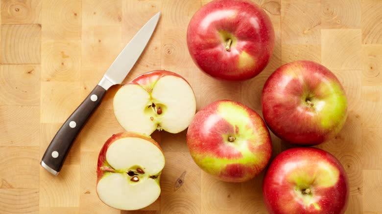 paring knife with apples