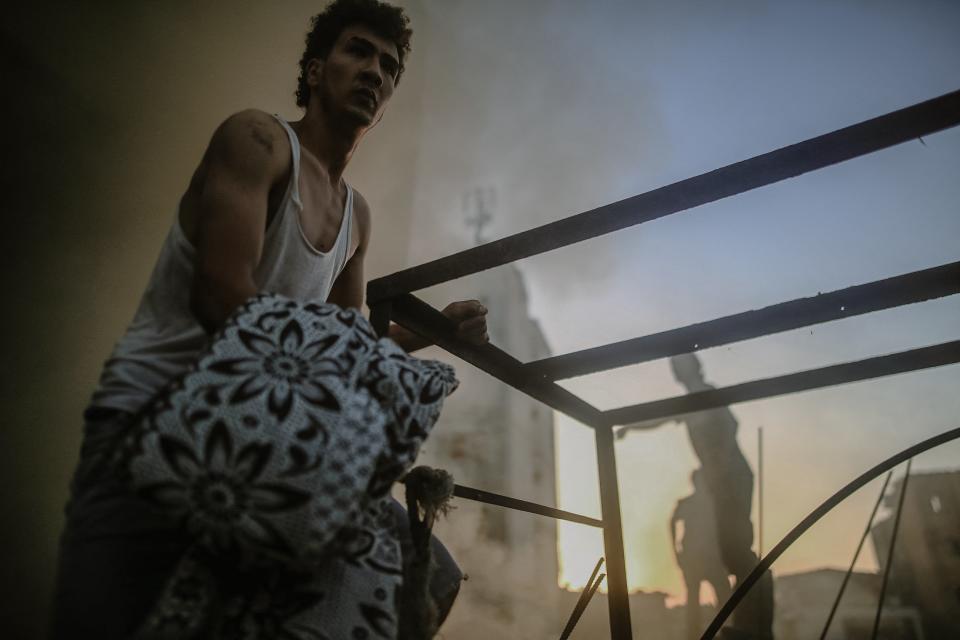 Within the ruins of the Najar family’s building, many lives were lost, including children (Middle East Images/AFP via Getty)