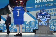 Alabama cornerback Terrion Arnold poses being chosen by the Detroit Lions with the 24th overall pick during the first round of the NFL football draft, Thursday, April 25, 2024, in Detroit. (AP Photo/Jeff Roberson)